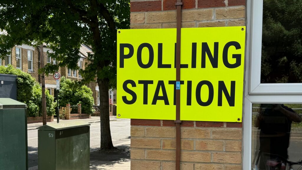 Polling Station sign for the 2024 general election at Raynes Park library