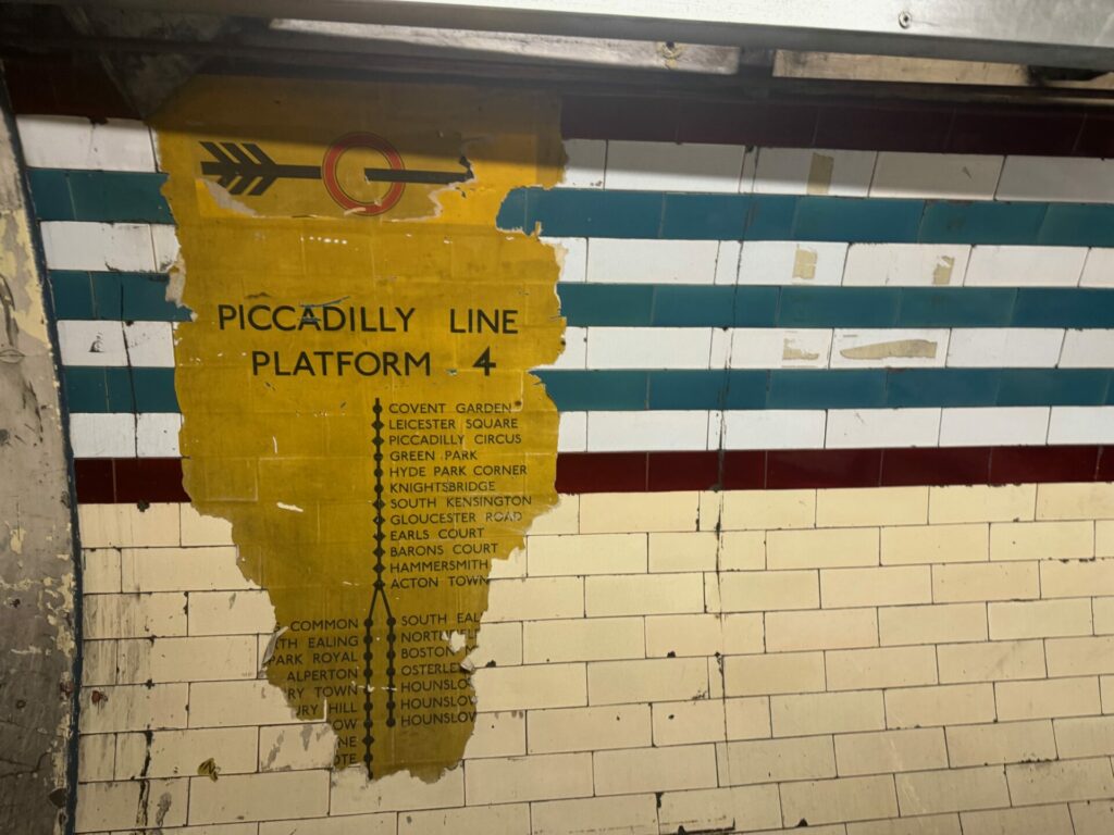 A poster featuring a list of Piccadilly Line stations from before World War 2