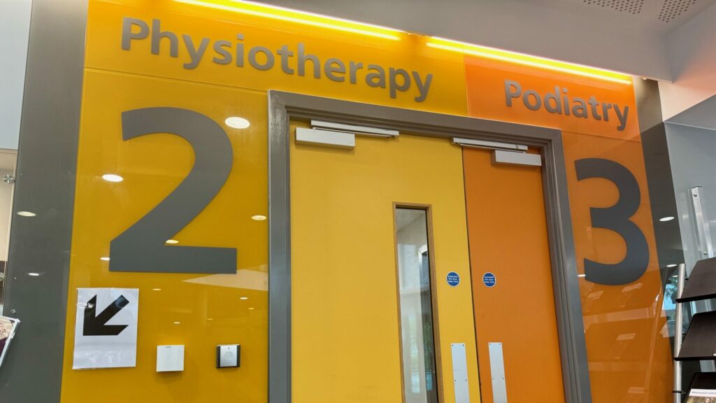 The physiotherapy waiting space at The Nelson Clinic - orange and yellow everywhere.