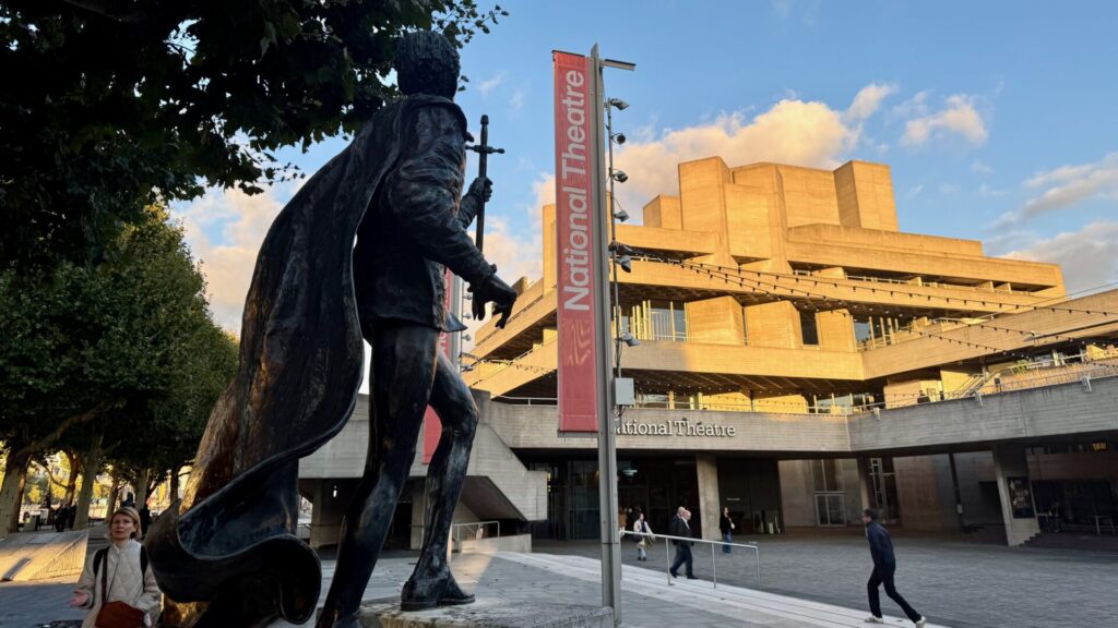 A view of the concrete blocks of the National Theatre, with the statue of Laurence Olivier in the foreground